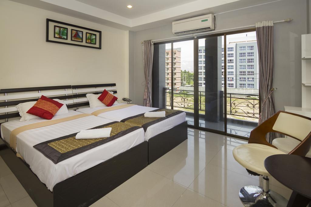Royal Q & D Suites Pattaya Esterno foto